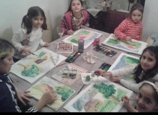 Kids drawing shapes and creative scenes