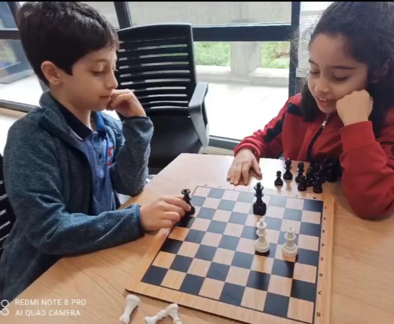 Kids doing classroom brain game activities